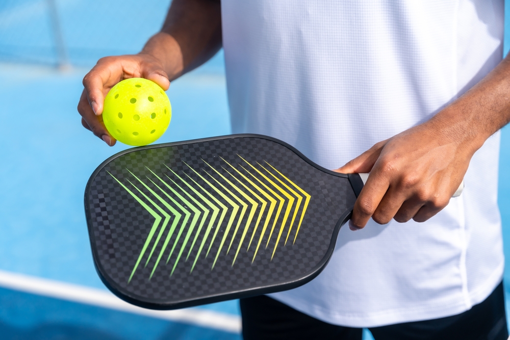 Unrecognizable,Close-up,Sportive,Man,With,Pickleball,Equipment,Holding,Racket,And